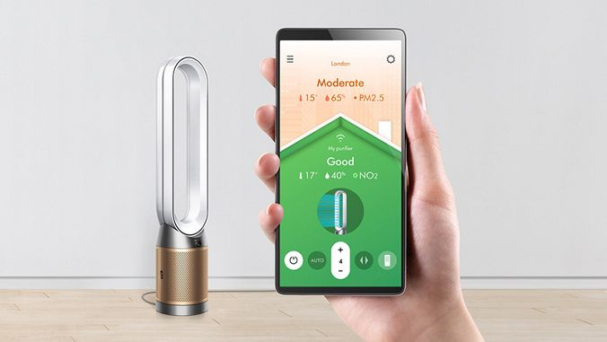 Image showing person holding phone with Dyson App connected to air purifier