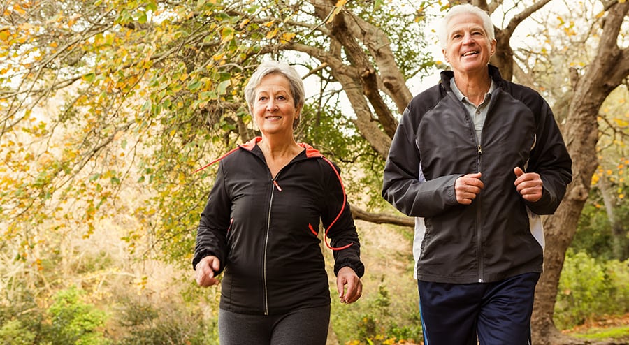 Aging couple running