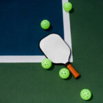 Pickleball court, paddle and balls